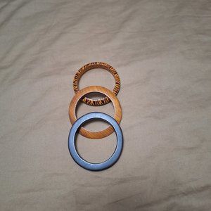 THREE WOODEN BANGLES